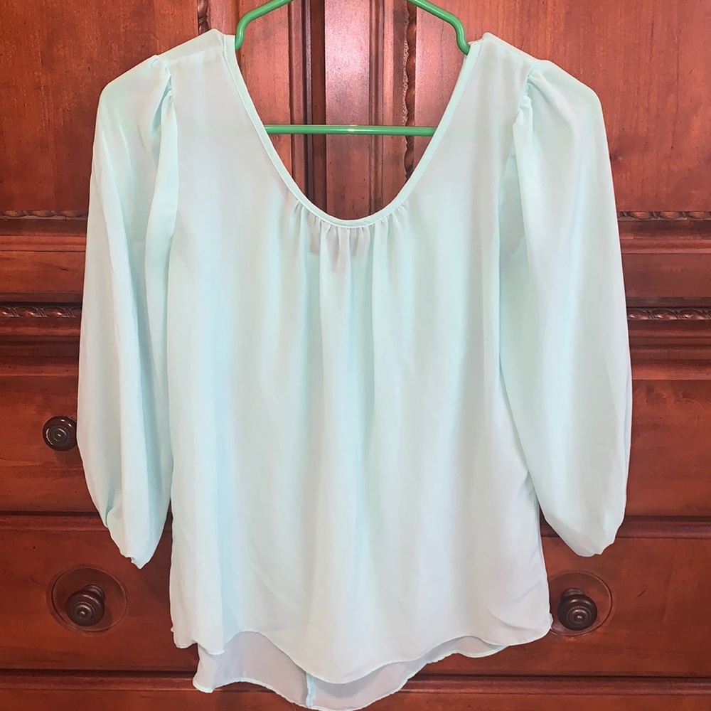Light blue/teal blouse